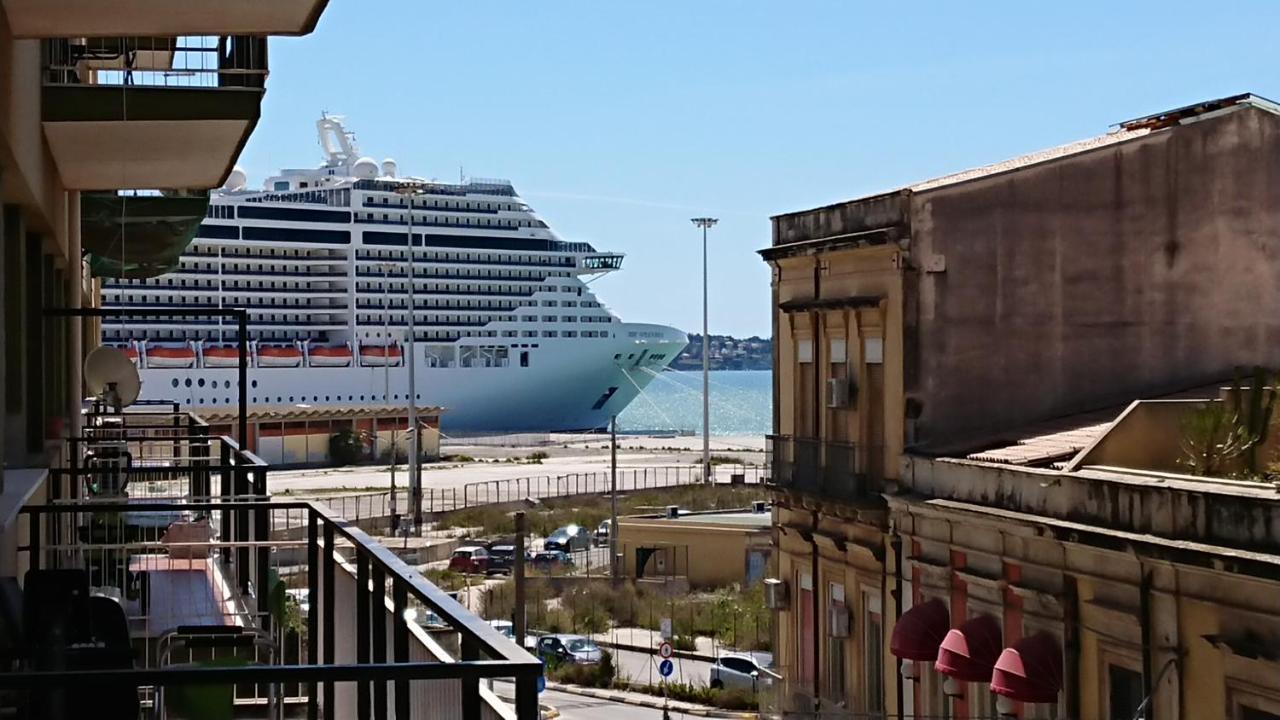 Agora * Syracuse